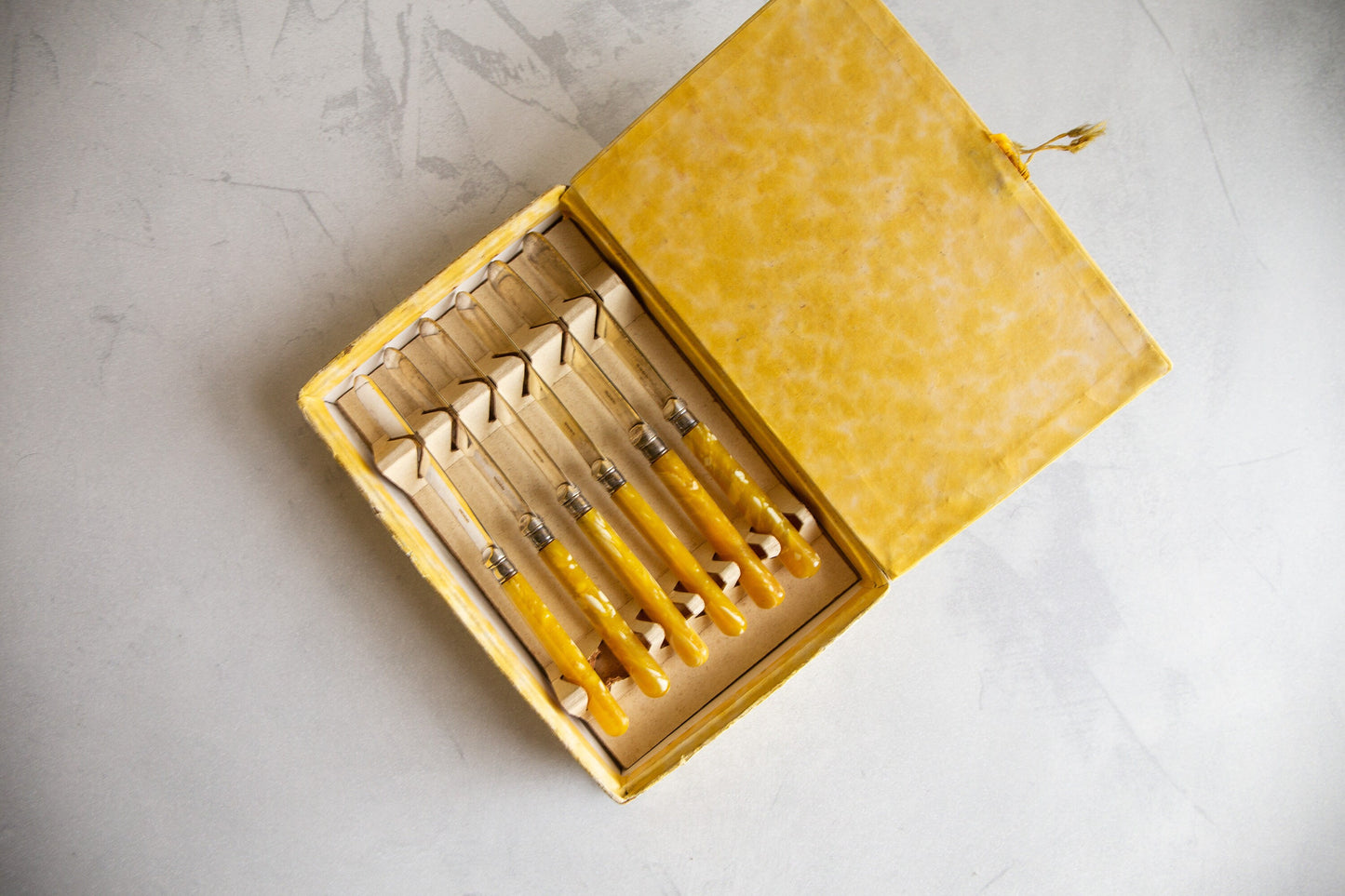 Set of 6 Vintage Yellow Marbled Knives